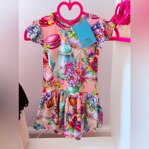 Posh peanut twirl bodysuit